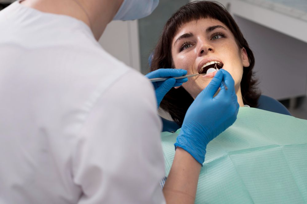 Expert dentist carefully performing a safe tooth removal procedure on a patient